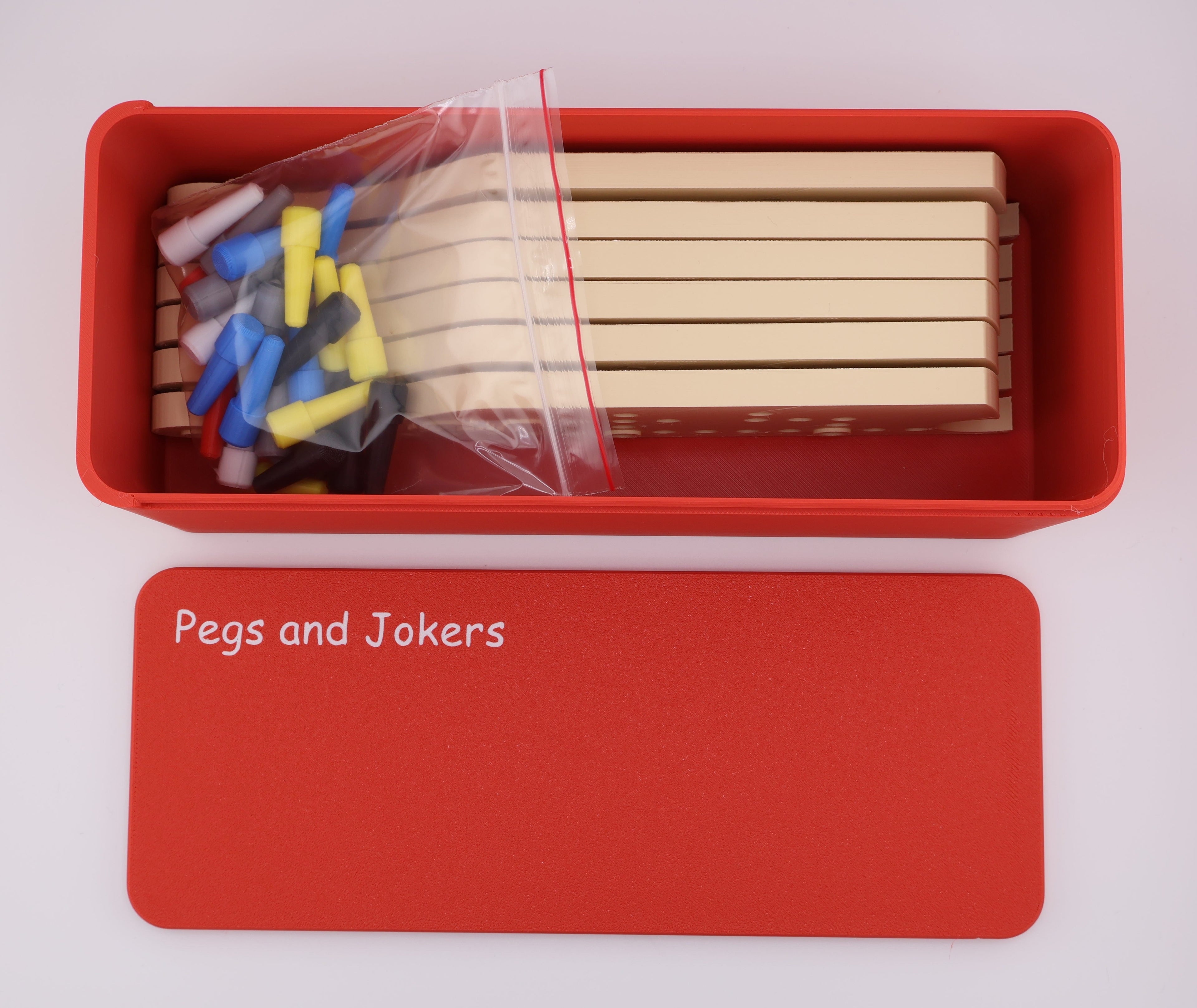 Pegs and Jokers Board game